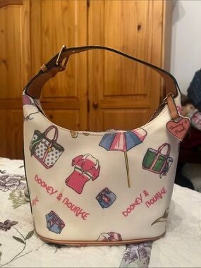 Dooney & Bourke Cream Shoulder Bag with Pink, Green & Blue Beach Print